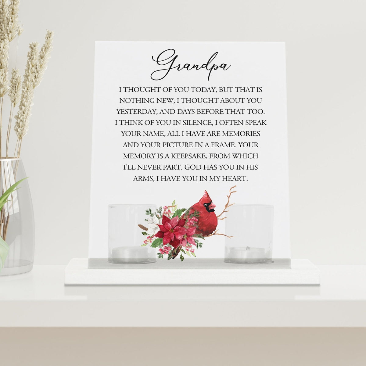 A beautifully crafted candle holder for votive candles, designed as a memorial gift. The Lifesong Milestones Cardinal Memorial Frosted Acrylic Sign with Base stands at the center, radiating comfort and remembrance.