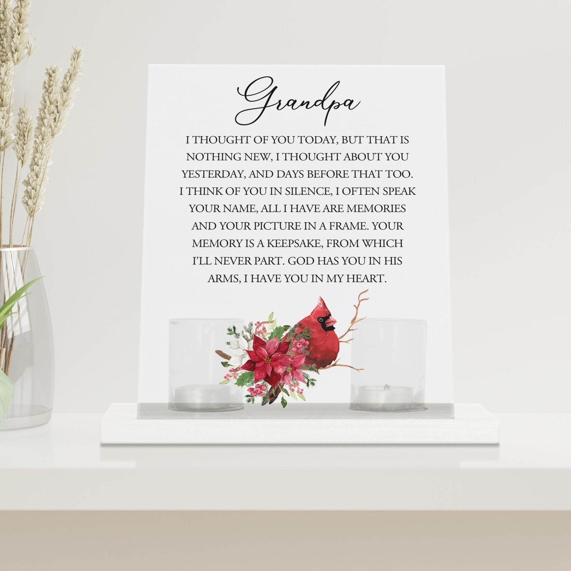 A beautifully crafted candle holder for votive candles, designed as a memorial gift. The Lifesong Milestones Cardinal Memorial Frosted Acrylic Sign with Base stands at the center, radiating comfort and remembrance.