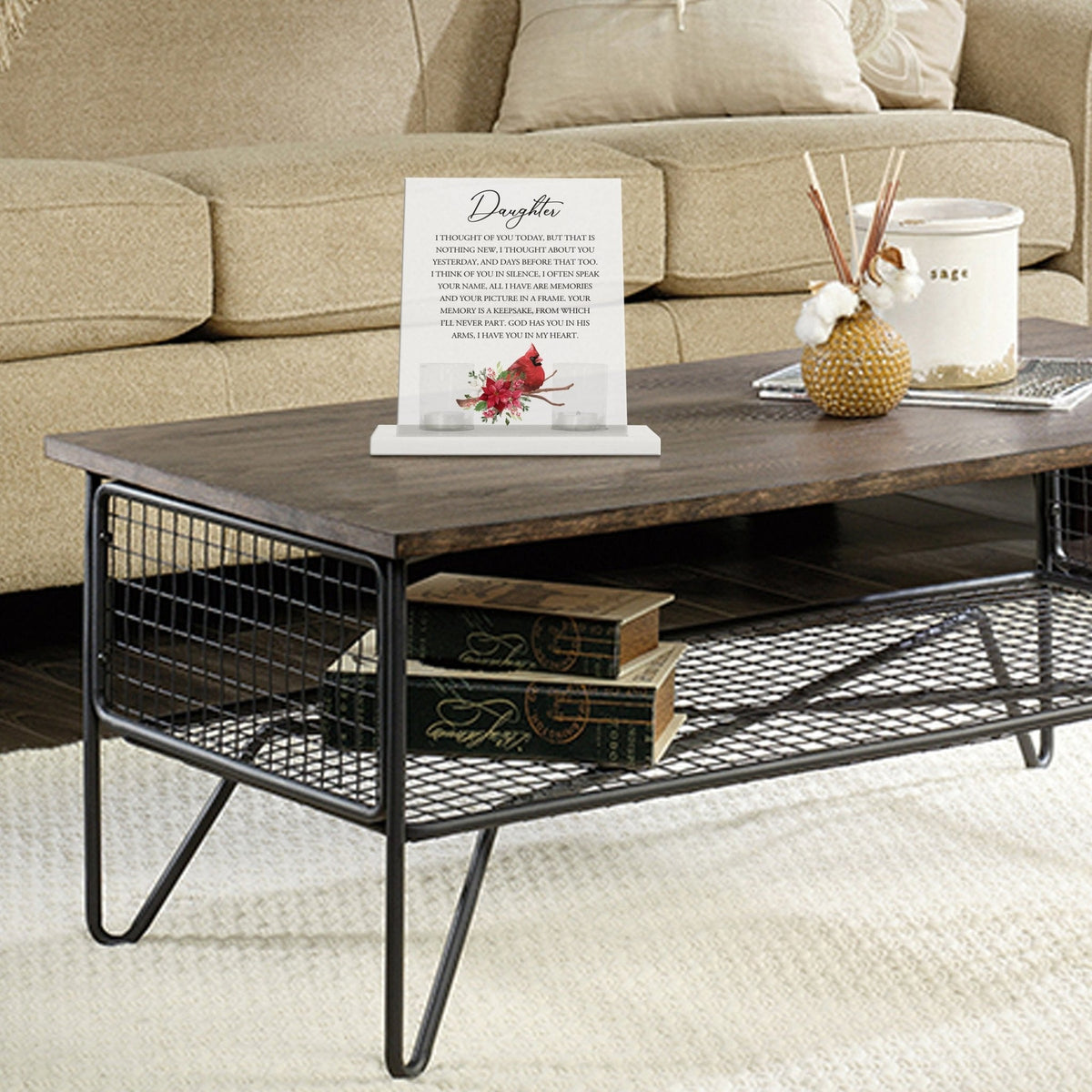 A heartfelt table decor setup with a tealight candle holder and votive candles.