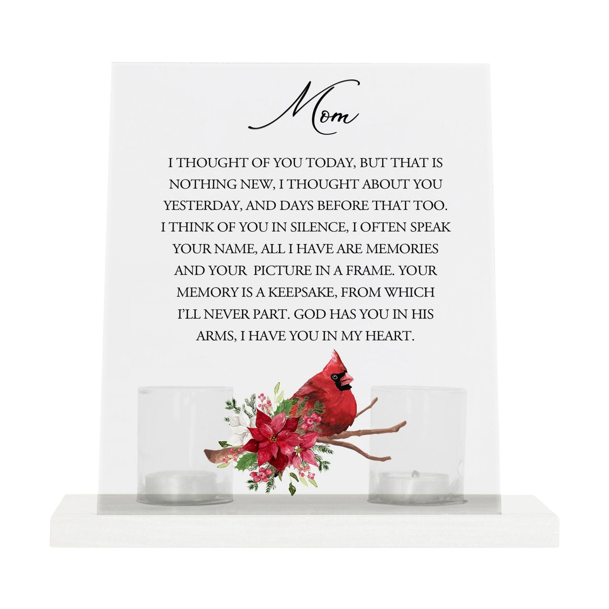 A heartfelt table decor setup with a tealight candle holder and votive candles.