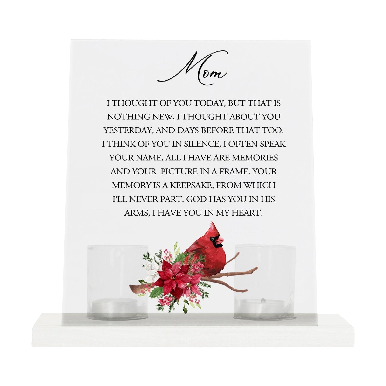 A heartfelt table decor setup with a tealight candle holder and votive candles.