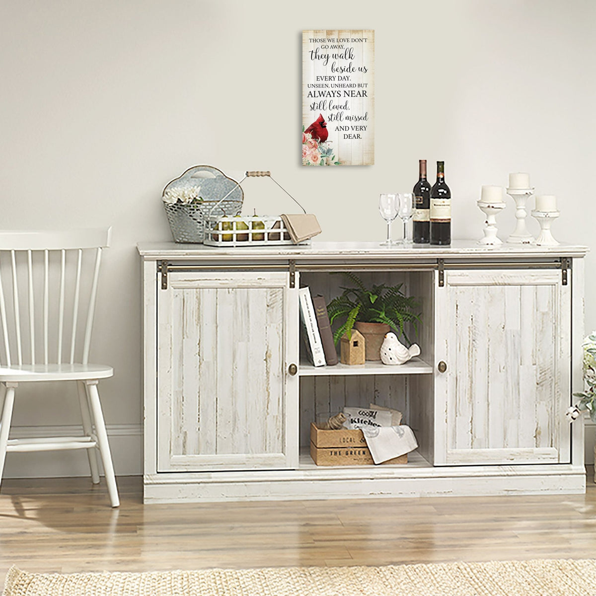 A wooden memorial wall plaque featuring a cardinal, a symbol of remembrance and love.