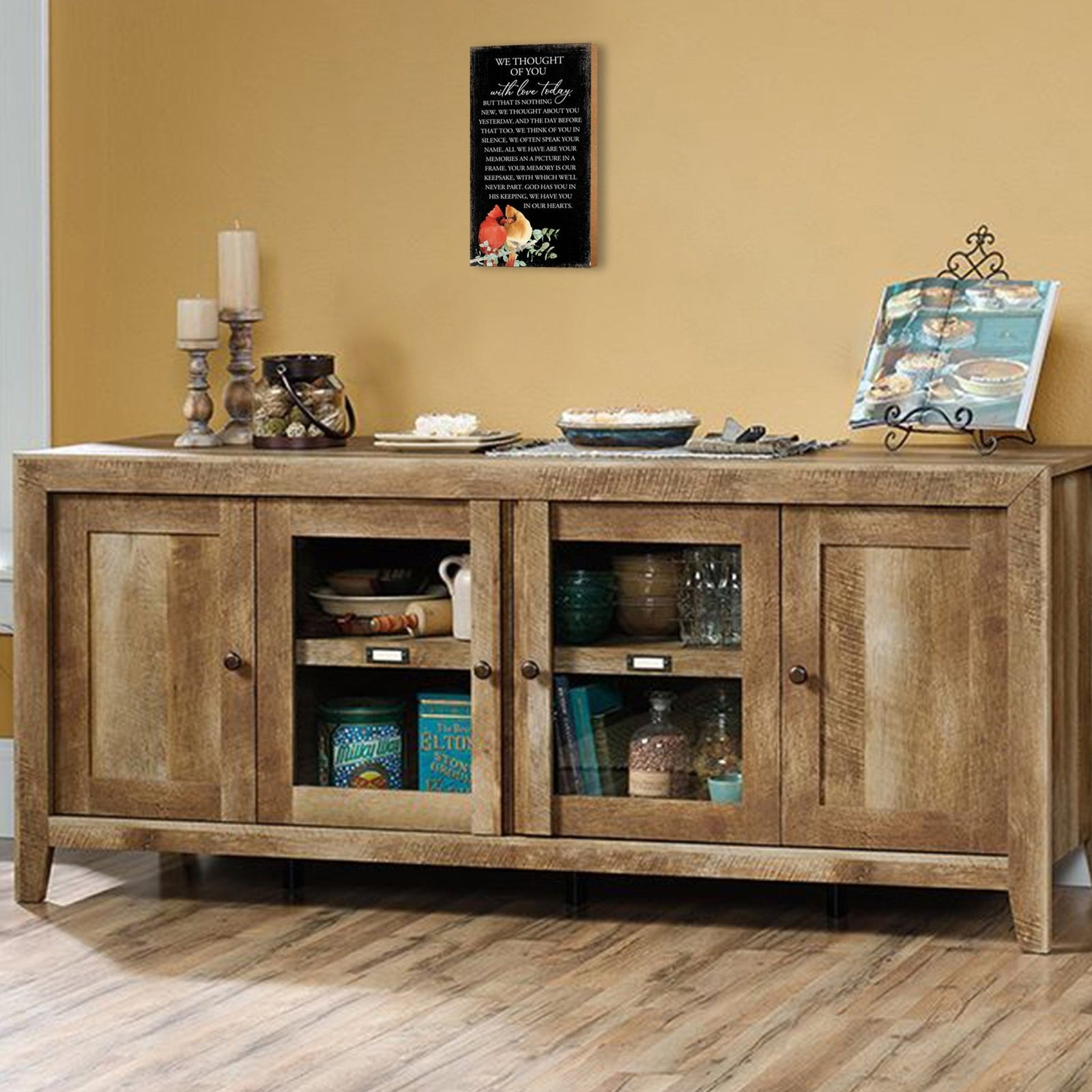 A wooden memorial wall plaque with a heartfelt design.