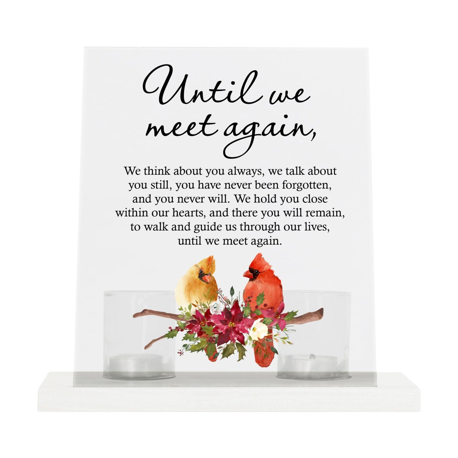 A solemn memorial display featuring a Lifesong Milestones Cardinal Memorial Frosted Acrylic Sign with Base and Votive Candle Holder. The tealight candle holder provides a warm glow, while votive candles surround it, creating a touching memory.