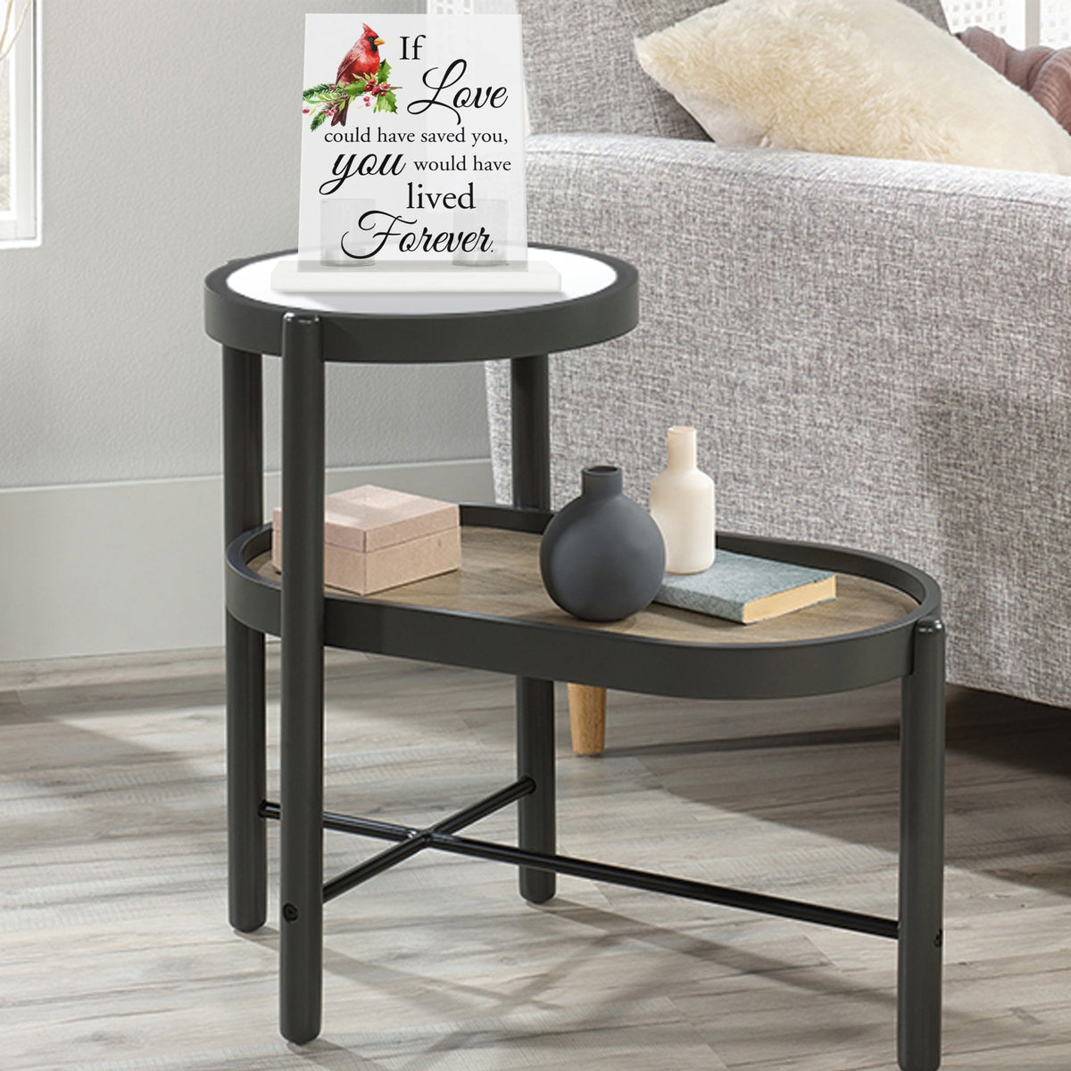 A heartfelt table decor setup with a tealight candle holder and votive candles.