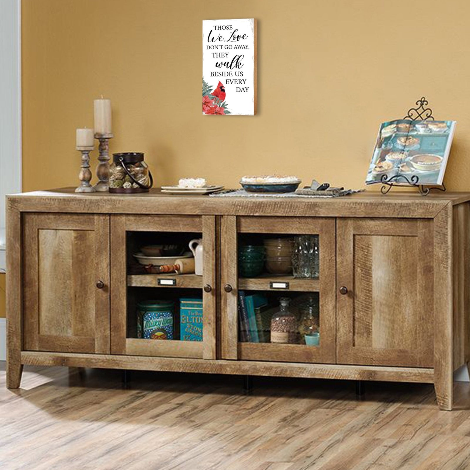 A wooden memorial wall plaque with a heartfelt design.