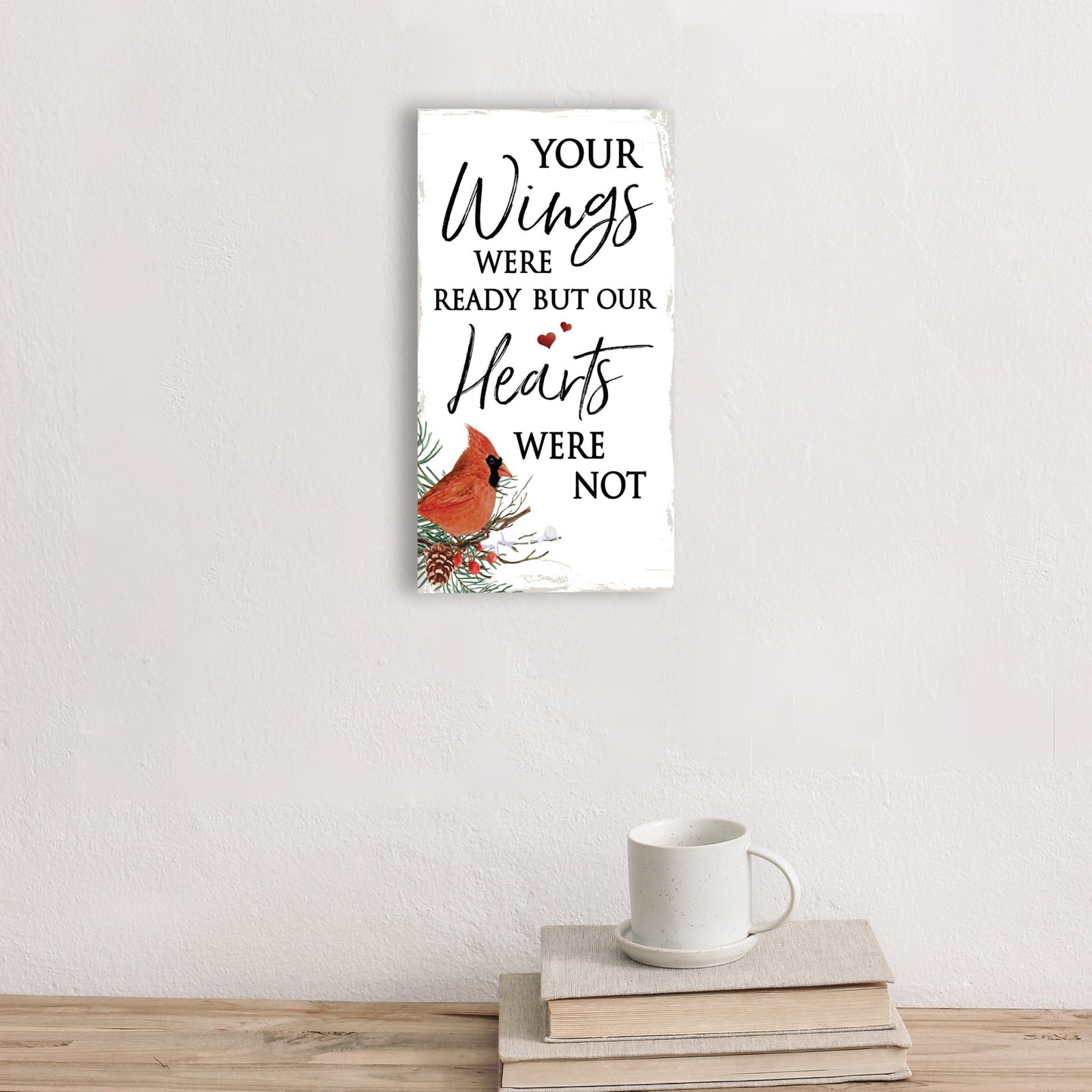 A wooden memorial wall plaque with a heartfelt design.