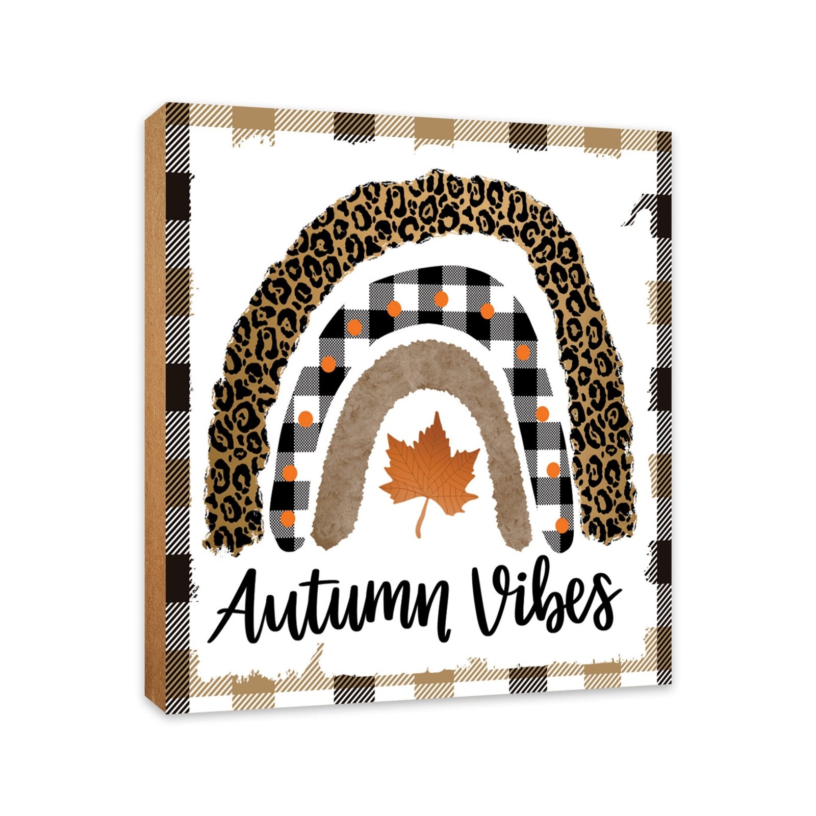 A close-up of a wooden tabletop adorned with inspirational fall signs, enhancing your home decor