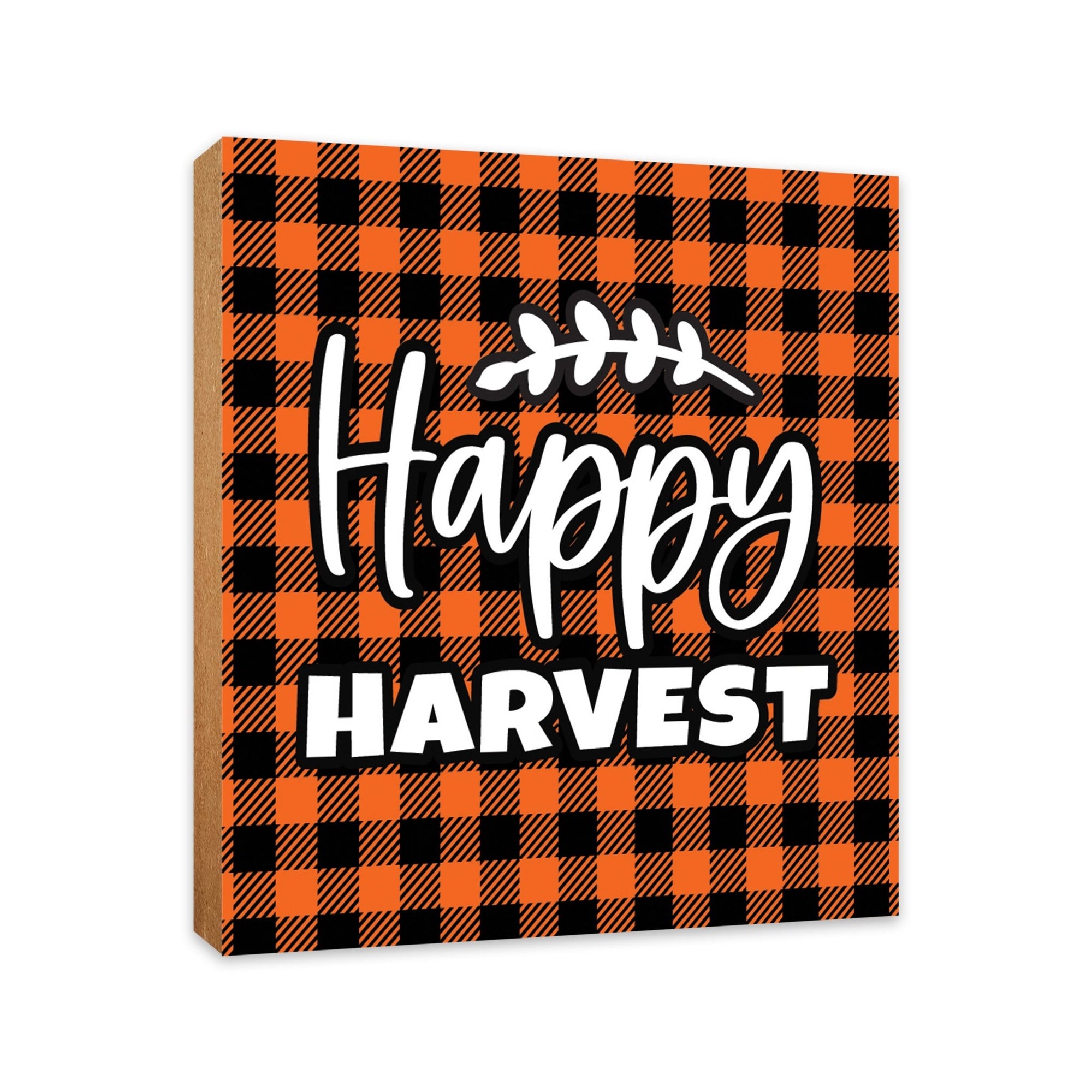 A close-up of a wooden tabletop adorned with inspirational fall signs, enhancing your home decor