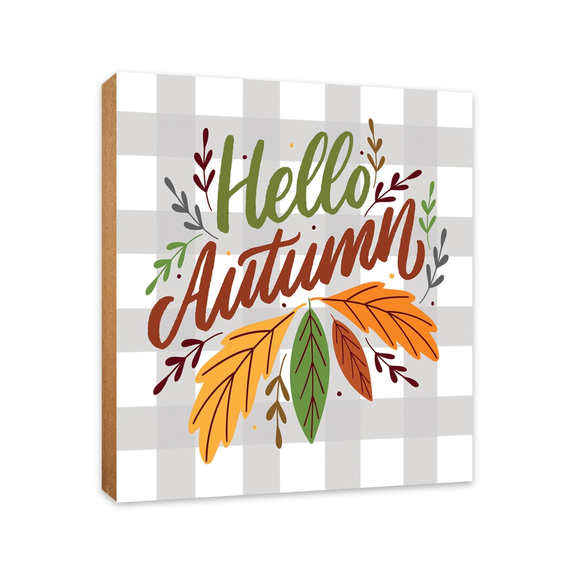 A close-up of a wooden tabletop adorned with inspirational fall signs, enhancing your home decor