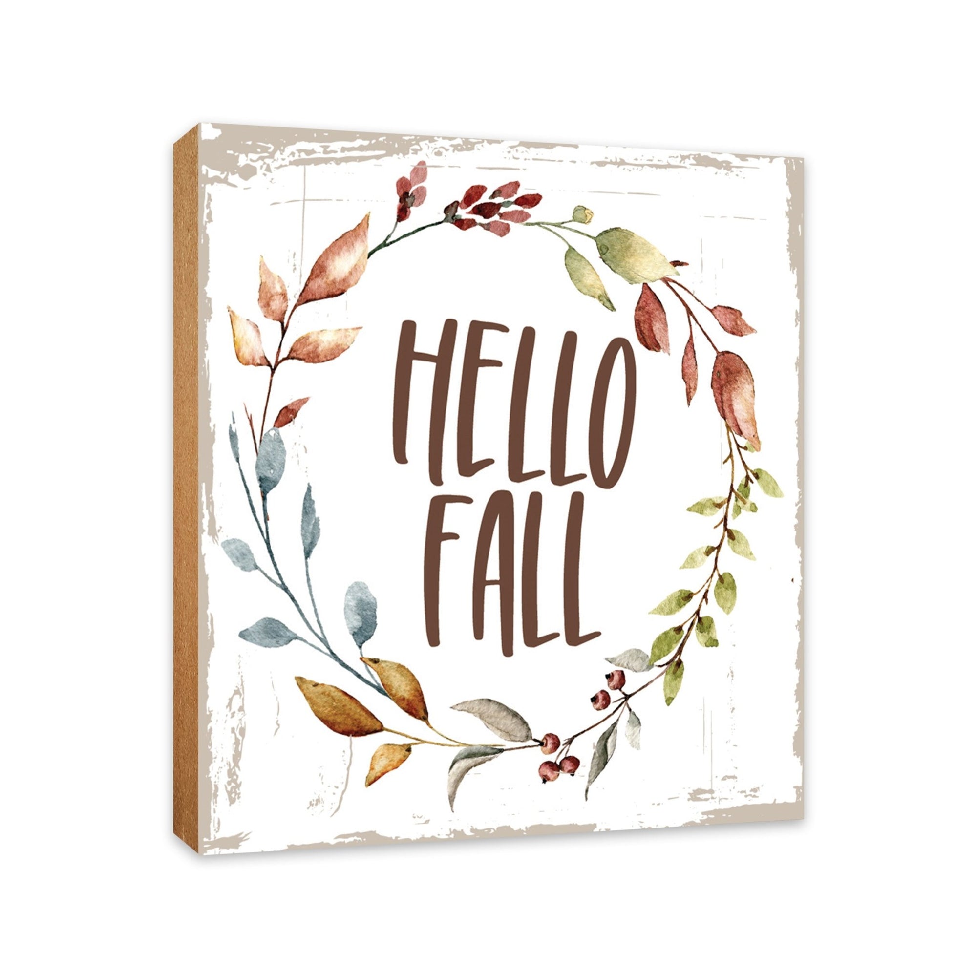 A close-up of a wooden tabletop adorned with inspirational fall signs, enhancing your home decor