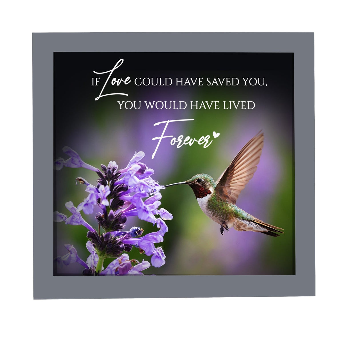 A framed shadow box with a heartfelt memorial tribute inside