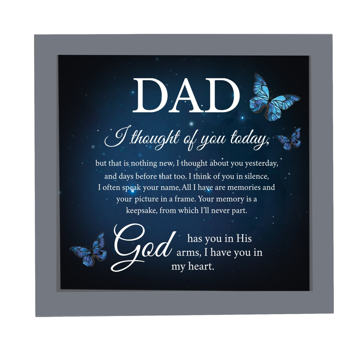 A framed shadow box with a heartfelt memorial tribute inside