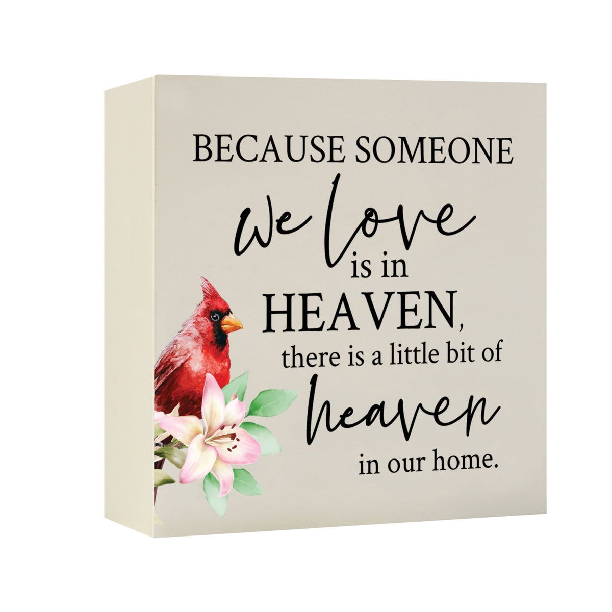 Close-up of a beautiful wooden shadow box urn for human ashes, accented with a red cardinal and white flowers. This adult memorial urn is both a heartfelt tribute and a decorative piece.