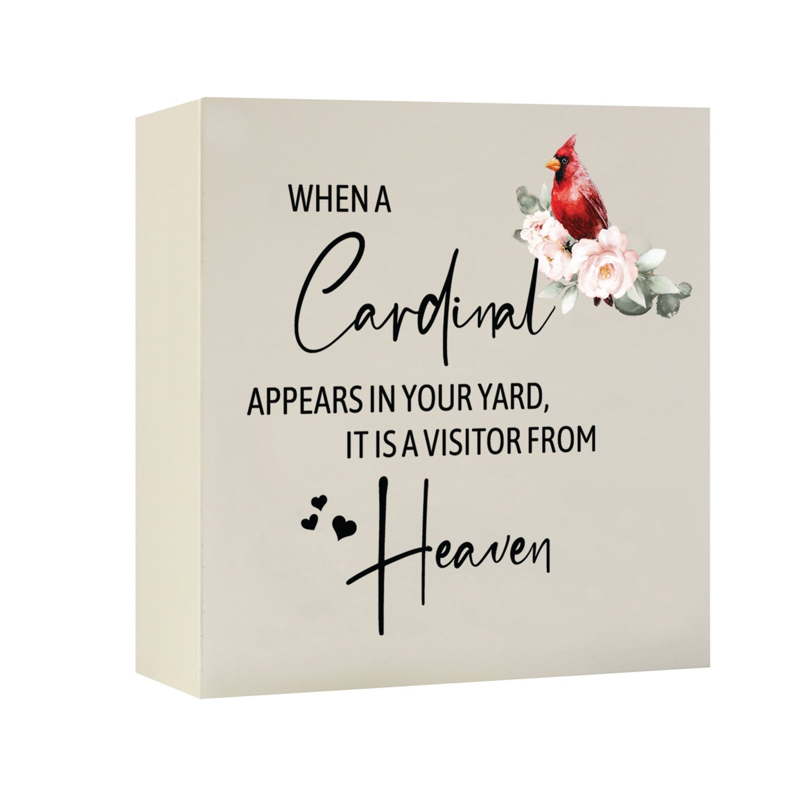 Close-up of a beautiful wooden shadow box urn for human ashes, accented with a red cardinal and white flowers. This adult memorial urn is both a heartfelt tribute and a decorative piece.