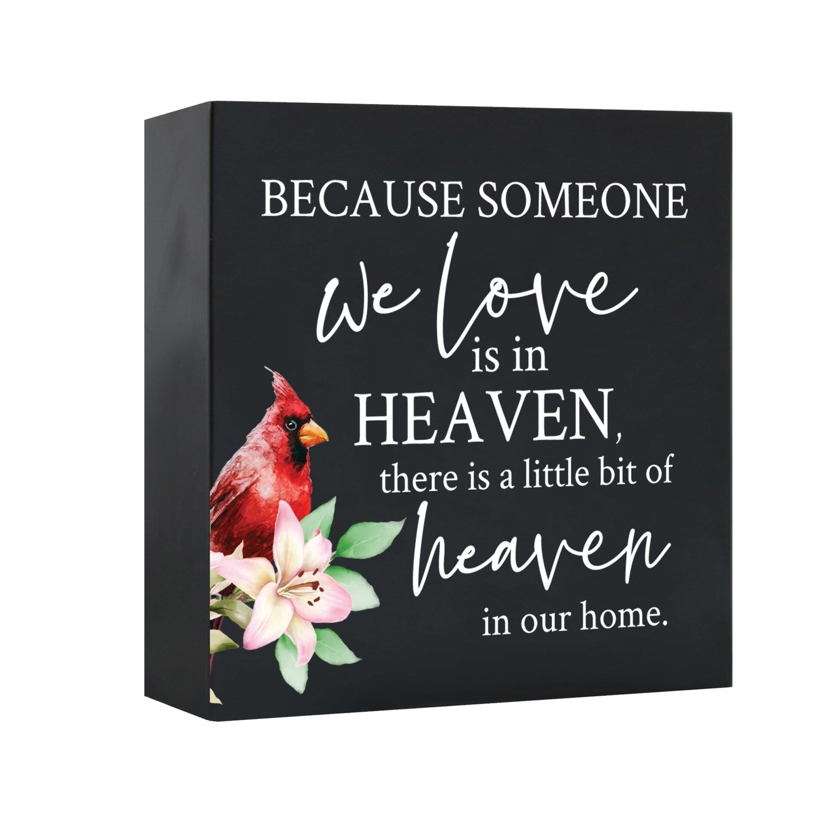 Close-up of a beautiful wooden shadow box urn for human ashes, accented with a red cardinal and white flowers. This adult memorial urn is both a heartfelt tribute and a decorative piece.