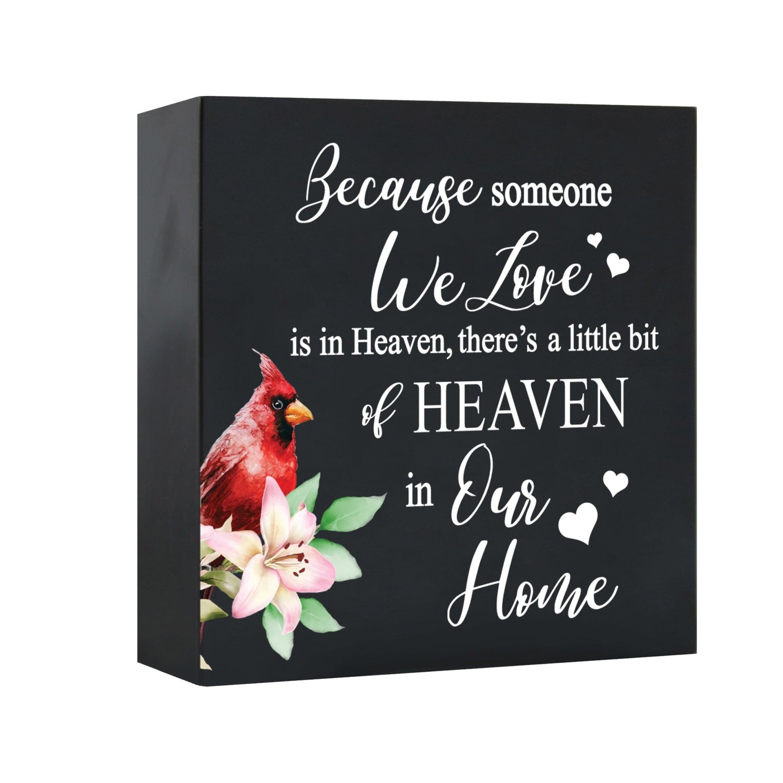Close-up of a beautiful wooden shadow box urn for human ashes, accented with a red cardinal and white flowers. This adult memorial urn is both a heartfelt tribute and a decorative piece.