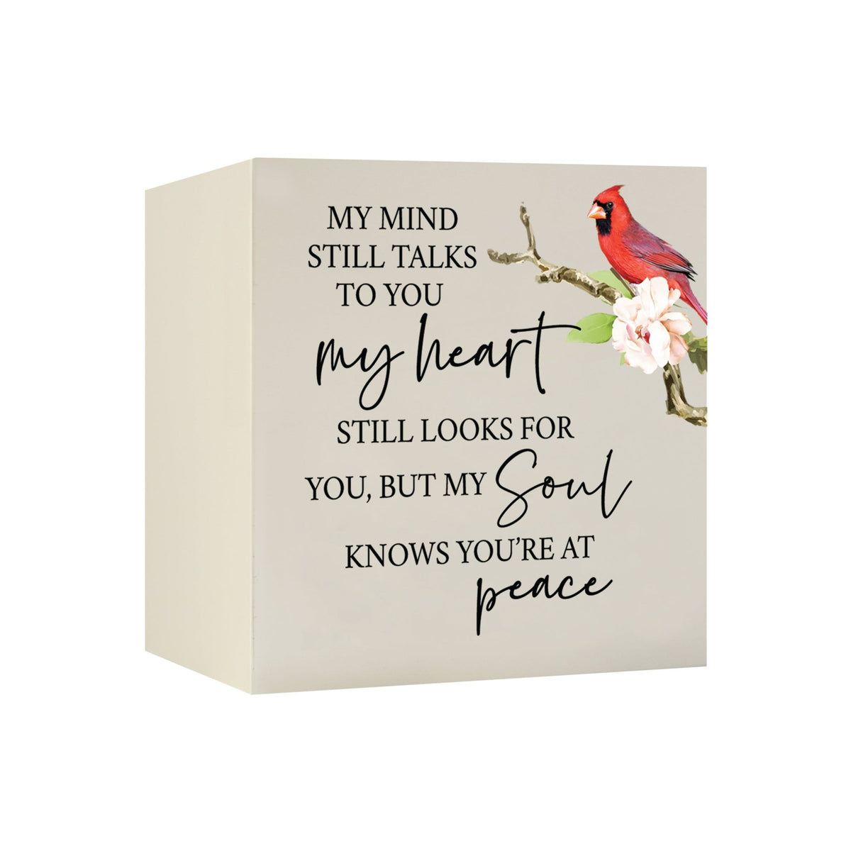 Close-up of a beautiful wooden shadow box urn for human ashes, accented with a red cardinal and white flowers. This adult memorial urn is both a heartfelt tribute and a decorative piece.