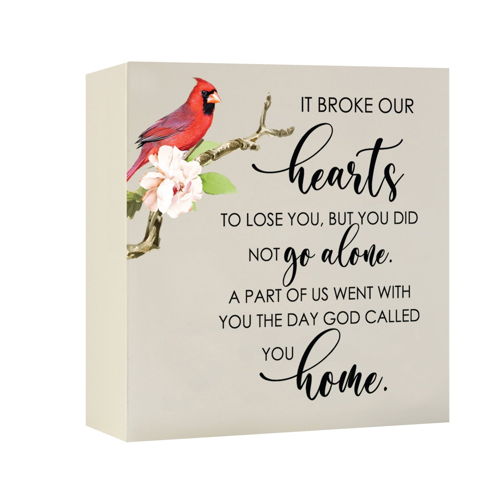 Close-up of a beautiful wooden shadow box urn for human ashes, accented with a red cardinal and white flowers. This adult memorial urn is both a heartfelt tribute and a decorative piece.