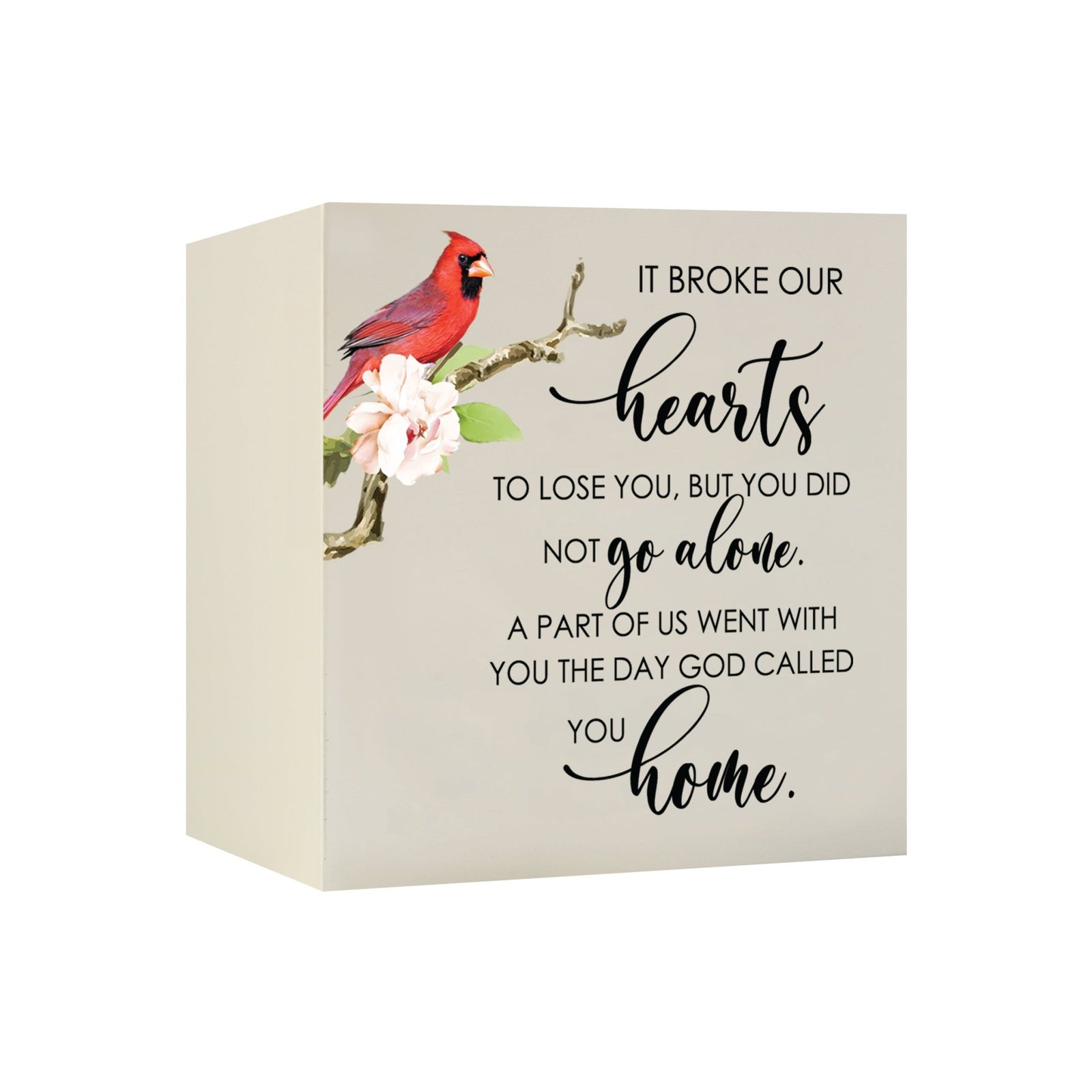 Close-up of a beautiful wooden shadow box urn for human ashes, accented with a red cardinal and white flowers. This adult memorial urn is both a heartfelt tribute and a decorative piece.