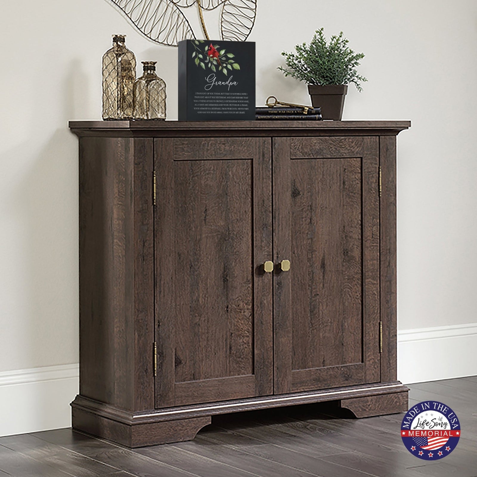 A wooden cremation urn box with a decorative design, suitable for holding human ashes.