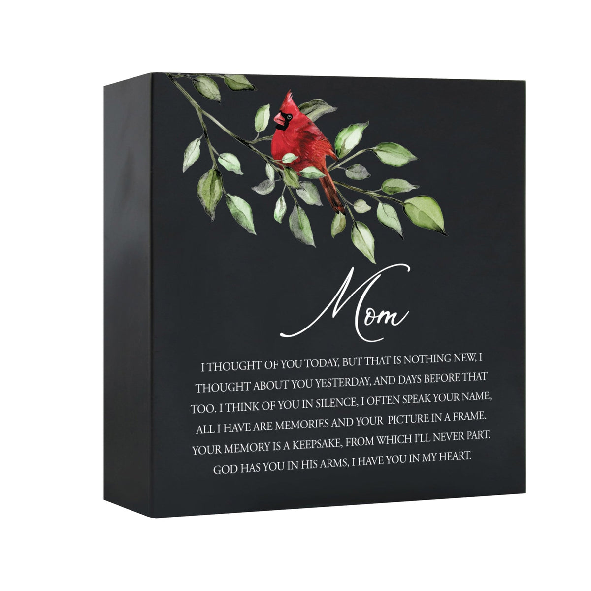 Close-up of a beautiful wooden black shadow box urn for mom accented with a red cardinal and white flowers. This adult memorial urn is both a heartfelt tribute and a decorative piece.