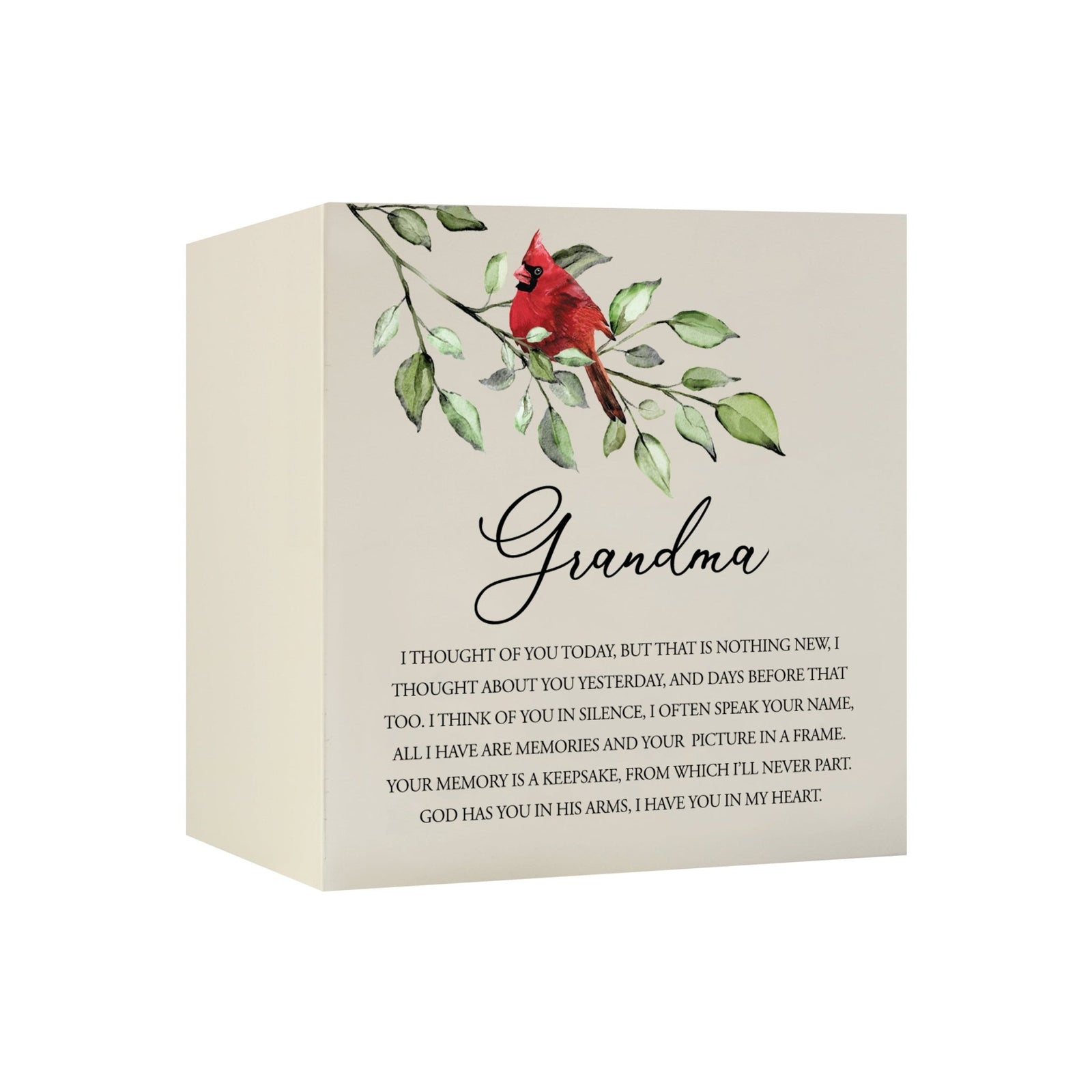 Close-up of a beautiful wooden shadow box urn for grandma, accented with a red cardinal and white flowers. This adult memorial urn is both a heartfelt tribute and a decorative piece.