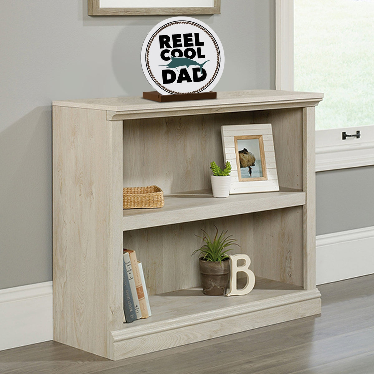 Minimalist White Round Sign With Wooden Base For A Fisherman Dad Gift Ideas - Reel Cool Dad - LifeSong Milestones