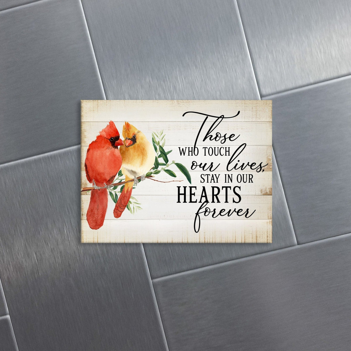 A cardinal magnet that serves as a lasting memorial decoration, offering comfort and solace.