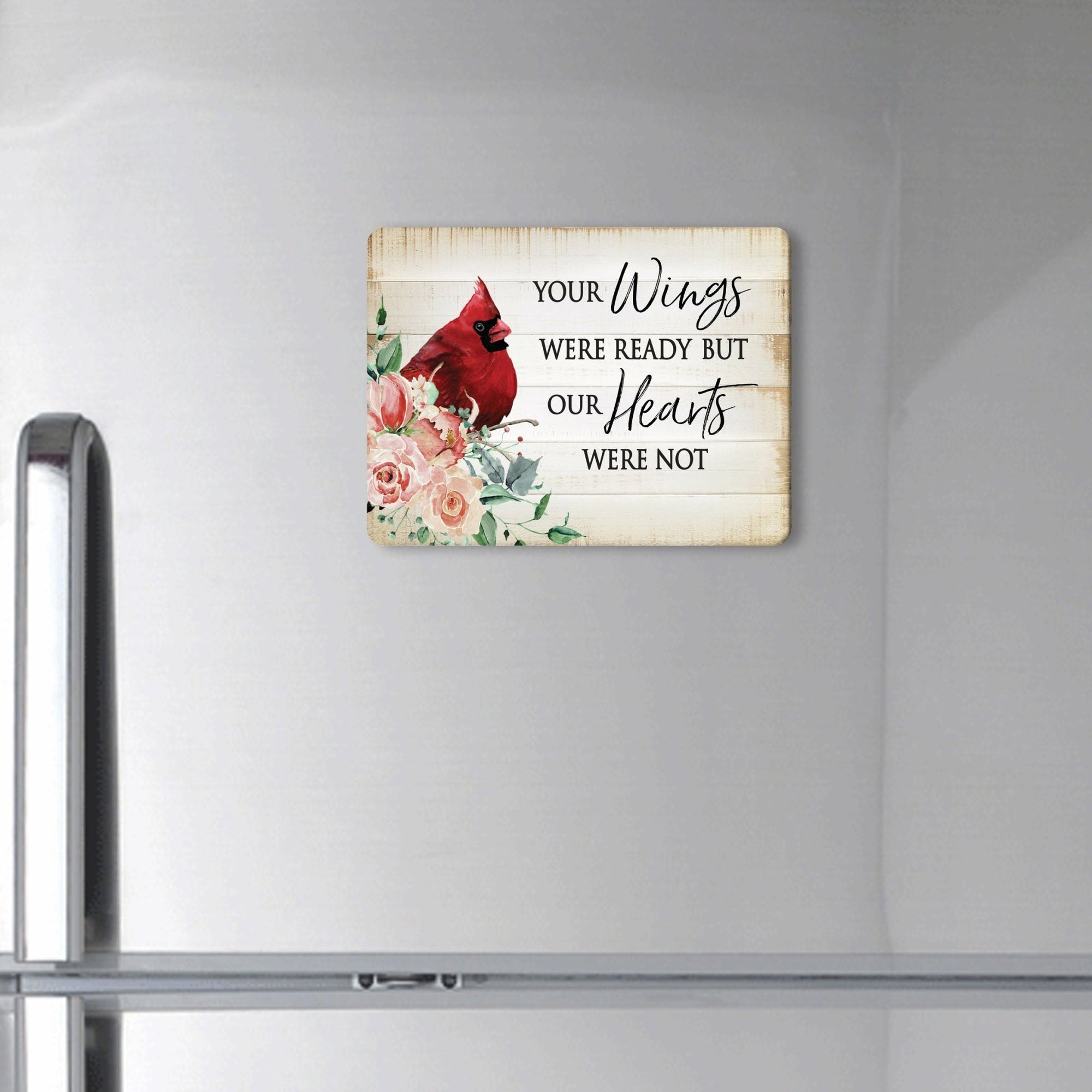 A modern cardinal magnet gracing a refrigerator - a heartfelt memorial home decoration.